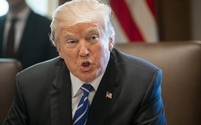 US President Donald Trump speaks during a Cabinet Meeting in the Cabinet Room of the White House in Washington, DC, November 20, 2017. (AFP PHOTO / SAUL LOEB) US President Donald Trump speaks during a Cabinet Meeting in the Cabinet Room of the White House in Washington, DC, November 20, 2017. (AFP PHOTO / SAUL LOEB)