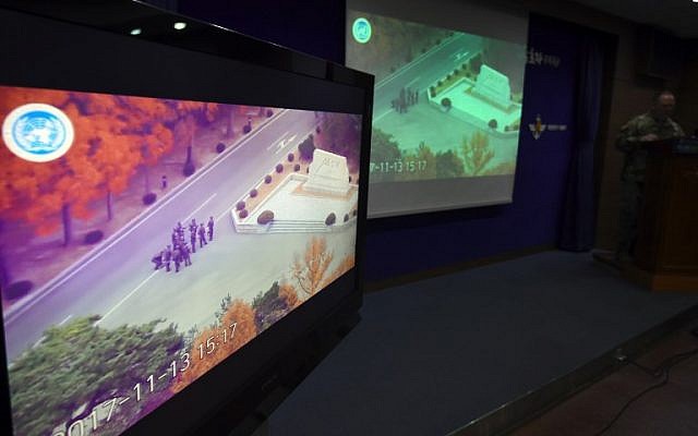 United Nations Command spokesman Col. Chad G. Carroll shows surveillance TV footage containing the moment of defection of a North Korean soldier, during a press briefing at the Defense Ministry in Seoul, South Korea, on November 22, 2017. (AFP Photo/Jung Yeon-Je) United Nations Command spokesman Col. Chad G. Carroll shows surveillance TV footage containing the moment of defection of a North Korean soldier, during a press briefing at the Defense Ministry in Seoul, South Korea, on November 22, 2017. (AFP Photo/Jung Yeon-Je)