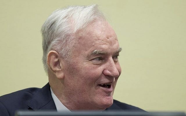 Former Bosnian Serb commander Ratko Mladic enters the International Criminal Tribunal for the former Yugoslavia (ICTY), on November 22, 2017, to hear the verdict in his genocide trial. (AFP PHOTO / POOL / Peter Dejong) Former Bosnian Serb commander Ratko Mladic enters the International Criminal Tribunal for the former Yugoslavia (ICTY), on November 22, 2017, to hear the verdict in his genocide trial. (AFP PHOTO / POOL / Peter Dejong)