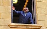 Lebanese prime minister Saad Hariri greets his supporters upon his arrival at his home in Beirut on November 22, 2017. (AFP PHOTO / STR)
