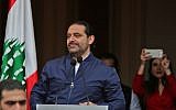 Lebanese Prime Minister Saad Hariri greets supporters upon arriving at his home in Beirut on November 22, 2017. (AFP Photo/Stringer)