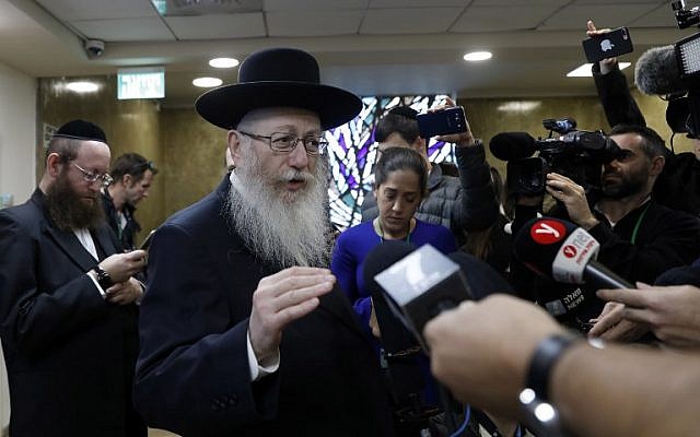 Then-health minister Yaakov Litzman, who is also chairman of the ultra-Orthodox United Torah Judaism party, speaks to journalists after handing in his resignation to Prime Minister Benjamin Netanyahu (unseen) in Jerusalem, November 26, 2017. (AFP/Gali Tibbon) Then-health minister Yaakov Litzman, who is also chairman of the ultra-Orthodox United Torah Judaism party, speaks to journalists after handing in his resignation to Prime Minister Benjamin Netanyahu (unseen) in Jerusalem, November 26, 2017. (AFP/Gali Tibbon)