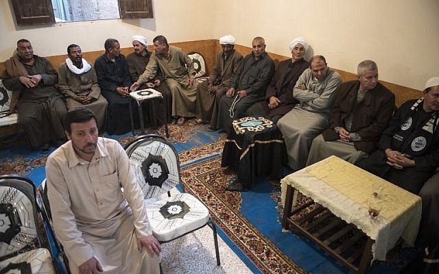 Egyptians attend the funeral of Fethy Ismail who died in an attack by IS terrorists near the North Sinai provincial capital of El-Arish, on November 26 2017. (Muhammad Shahed/AFP) Egyptians attend the funeral of Fethy Ismail who died in an attack by IS terrorists near the North Sinai provincial capital of El-Arish, on November 26 2017. (Muhammad Shahed/AFP)