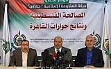 Hamas spokesman Fawzi Barhoum, right, attends a press conference with a senior official of the organization, Khalil al-Hayya, in Gaza City, November 27, 2017. (AFP/Mohammad Abed)