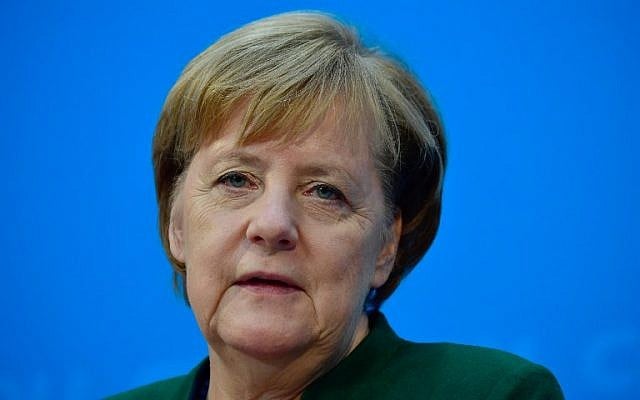 German Chancellor Angela Merkel gives a press conference on November 27, 2017, in Berlin, following a meeting with her conservative Christian Democratic Union (CDU) party's leadership. (AFP PHOTO / John MACDOUGALL) German Chancellor Angela Merkel gives a press conference on November 27, 2017, in Berlin, following a meeting with her conservative Christian Democratic Union (CDU) party's leadership. (AFP PHOTO / John MACDOUGALL)