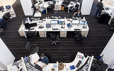 This file photo taken on March 3, 2016 shows a view of the newsroom in the Washington Post's building in Washington, DC. ( AFP PHOTO  Brendan Smialowski)