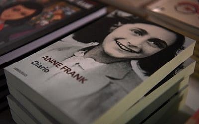 Copies of "The Diary of Anne Frank" are displayed at the exhibition 'Auschwitz. Not long ago. Not far away' on November 28, 2017 at the Arte Canal Exhibition Centre in Madrid. (AFP PHOTO / GABRIEL BOUYS