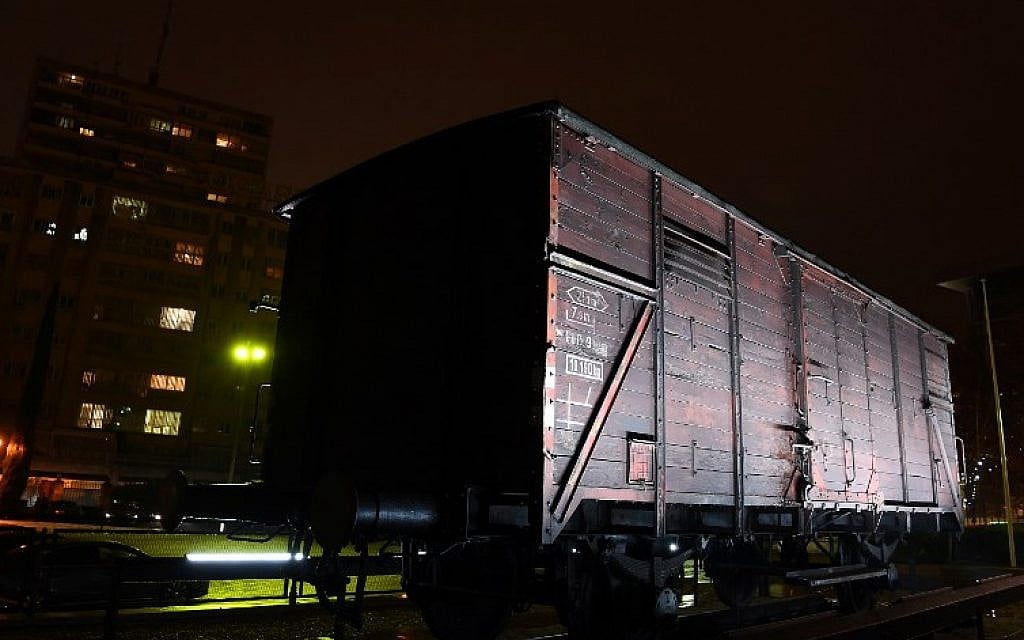 A wagon used to transport Jews to the Nazi death camps is displayed at the exhibition 'Auschwitz. Not long ago. Not far away' on November 28, 2017 at the Arte Canal Exhibition Centre in Madrid. (AFP PHOTO / GABRIEL BOUYS