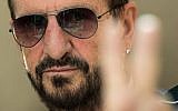This file photo taken on September 14, 2017 shows British musician and former Beatles member Ringo Starr posing for a photograph in London. (AFP PHOTO / CHRIS J RATCLIFFE)