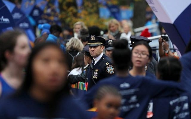 A New York City police officer looks on during the 2017 TCS New York City Marathon in Central Park on November 5, 2017 in New York City. (Elsa/Getty Images/AFP) A New York City police officer looks on during the 2017 TCS New York City Marathon in Central Park on November 5, 2017 in New York City. (Elsa/Getty Images/AFP)