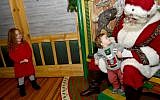 Illustrative: Guests visit Santa at Macy's Herald Square Santaland on November 17, 2017 in New York City. (Mike Coppola/Getty Images for Macy's/AFP)