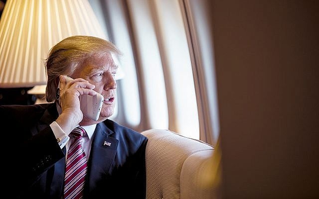 US President Donald Trump talks on the phone aboard Air Force One during a flight to Philadelphia, Pennsylvania, on January 26, 2017. (Shealah Craighead/White House) US President Donald Trump talks on the phone aboard Air Force One during a flight to Philadelphia, Pennsylvania, on January 26, 2017. (Shealah Craighead/White House)
