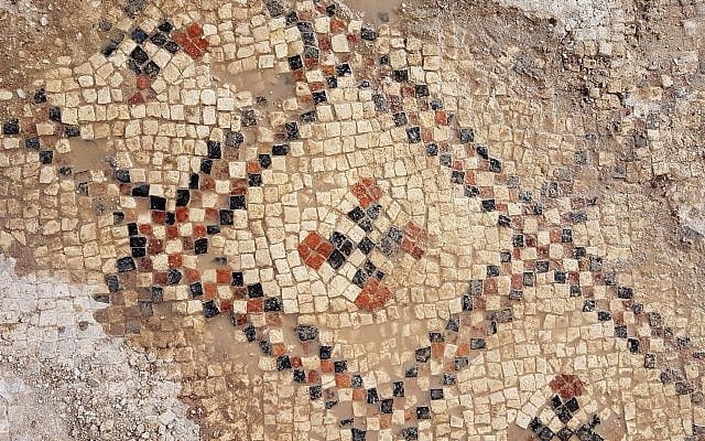Working on the 1,500-year-old mosaic at Ashdod-Yam. (Anat Rasiuk, Israel Antiquities Authority)