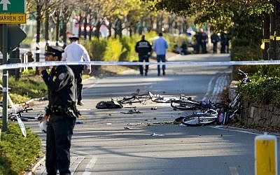 Bicycles and debris lay on a bike path after a motorist drove onto the path near the World Trade Center memorial, striking and killing several people Tuesday, Oct. 31, 2017, in New York. (AP Photo/Craig Ruttle)