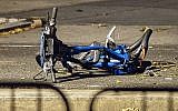 A bicycle lies on a bike path at the crime scene where a motorist earlier Tuesday drove onto the path near the World Trade Center memorial, striking and killing several people in a suspected terror attack, Wednesday, Nov. 1, 2017, in New York. (AP Photo/Andres Kudacki)