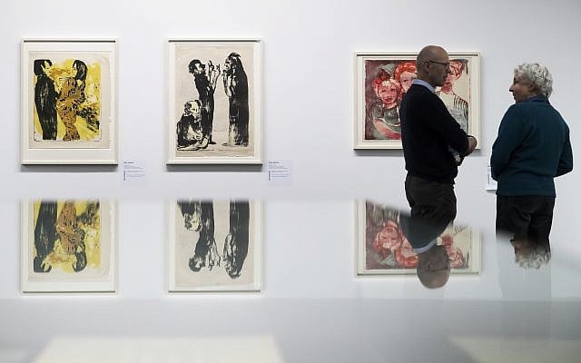 Two visitors in front of the paintings 'Junges Paar' (l), and 'Diskussion' of German painter Emil Nolde, in the exhibition 'Status Report Gurlitt. degenerate art -- confiscated and sold' in the Kunstmuseum in Bern, Switzerland, November 1, 2017. (Peter Klaunzer/Keystone via AP) Two visitors in front of the paintings 'Junges Paar' (l), and 'Diskussion' of German painter Emil Nolde, in the exhibition 'Status Report Gurlitt. degenerate art -- confiscated and sold' in the Kunstmuseum in Bern, Switzerland, November 1, 2017. (Peter Klaunzer/Keystone via AP)