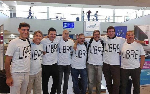 This Oct. 28, 2017 photo provided by the Trevisan family shows (from left to right) Hernan Ferruchi, Alejandro Pagnucco, Ariel Erlij, Ivan Brajckovic, Juan Pablo Trevisan, Hernan Mendoza, Diego Angelini and Ariel Benvenuto as they gather for a group photo before their trip to New York City, at the airport in Rosario, Argentina. (Courtesy of Trevisan family via AP) This Oct. 28, 2017 photo provided by the Trevisan family shows (from left to right) Hernan Ferruchi, Alejandro Pagnucco, Ariel Erlij, Ivan Brajckovic, Juan Pablo Trevisan, Hernan Mendoza, Diego Angelini and Ariel Benvenuto as they gather for a group photo before their trip to New York City, at the airport in Rosario, Argentina. (Courtesy of Trevisan family via AP)