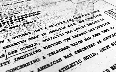 Part of a file from the CIA, dated Oct. 10, 1963, details "a reliable and sensitive source in Mexico" report of Lee Harvey Oswald's contact with the Soviet Union embassy in Mexico City, that was released for the first time on Friday, Nov. 3, 2017, by the National Archives. (AP Photo/Jon Elswick)
