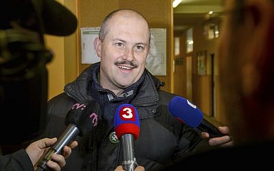 Banska Bystrica governor and far-right political leader Marian Kotleba speaks to journalists after casting his vote during the Slovak regional elections in Banska Bystrica, Central Slovakia, November 4, 2017. (Jan Miskovsky/CTK via AP)