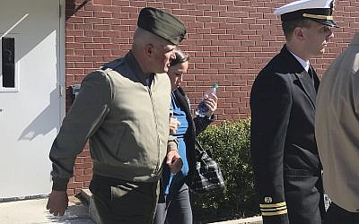 In this October 31, 2017 file photo, US Marine Gunnery Sgt. Joseph A. Felix, his wife, and his lawyers exit a courtroom after testimony at Camp Lejeune, North Carolina. (Rory Laverty/The Washington Post via AP)