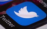 The Twitter app on a mobile phone. (AP Photo/Matt Rourke, File)