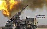 A frame grab from video provided by the government-controlled Syrian Central Military Media, shows firing on militants' positions on the Iraq-Syria border, November 8, 2017. (Syrian Central Military Media, via AP)