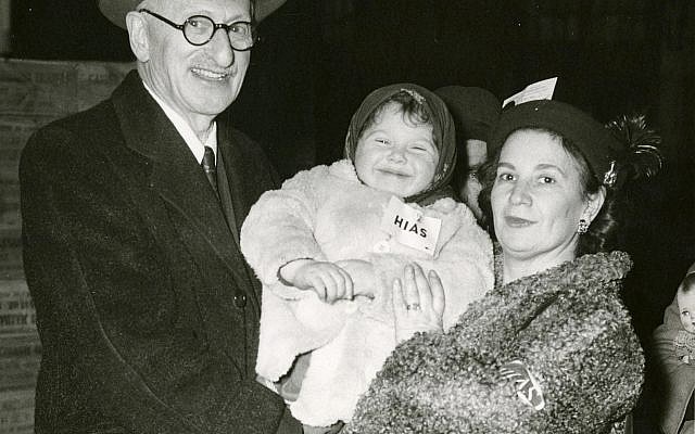 This circa 1940s photo provided by the Jewish Heritage Center at New England Historic Genealogical Society shows Hebrew Immigrant Aid Society representatives Samuel Kalesky and Helen Alpert with a young child. (Jewish Heritage Center at New England Historic Genealogical Society via AP) This circa 1940s photo provided by the Jewish Heritage Center at New England Historic Genealogical Society shows Hebrew Immigrant Aid Society representatives Samuel Kalesky and Helen Alpert with a young child. (Jewish Heritage Center at New England Historic Genealogical Society via AP)
