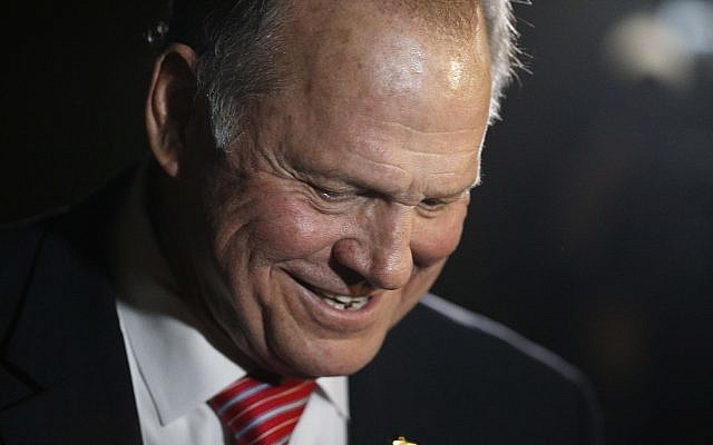 Former Alabama Chief Justice and US Senate candidate Roy Moore leaves after he speaks at a church revival, Tuesday, Nov. 14, 2017, in Jackson, Ala. (AP/Brynn Anderson) Former Alabama Chief Justice and US Senate candidate Roy Moore leaves after he speaks at a church revival, Tuesday, Nov. 14, 2017, in Jackson, Ala. (AP/Brynn Anderson)