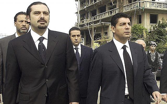 Bahaa Hariri, right, and Saad Hariri, sons of slain Lebanese former Prime Minister Rafik Hariri, visit the scene where their father was assassinated in Beirut, Lebanon, February 19, 2005. (AP) Bahaa Hariri, right, and Saad Hariri, sons of slain Lebanese former Prime Minister Rafik Hariri, visit the scene where their father was assassinated in Beirut, Lebanon, February 19, 2005. (AP)