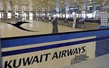 This March 18, 2012, photo shows a view of empty Kuwait Airways check-in counters at Kuwait Airport. (AP Photo/Gustavo Ferrari)