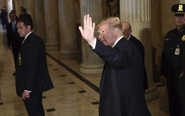 US President Donald Trump arrives on Capitol Hill in Washington, November 16, 2017. (AP Photo/Susan Walsh) US President Donald Trump arrives on Capitol Hill in Washington, November 16, 2017. (AP Photo/Susan Walsh)