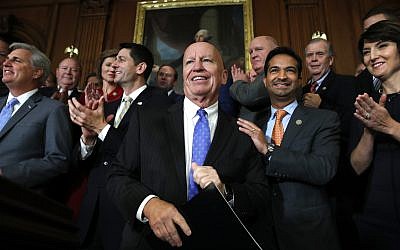 House Ways and Means Chair Rep. Kevin Brady, R-Texas, center, is welcomed by House Republicans including from left, House Majority Leader Kevin McCarthy of Calif., House Speaker Paul Ryan of Wis., Rep. Carlos Curbelo, R-Fla., and Rep. Cathy McMorris Rodgers, R-Wash., as they arrive to speak to the media following a vote on the GOP tax bill, November 16, 2017, on Capitol Hill in Washington. (AP Photo/Jacquelyn Martin)