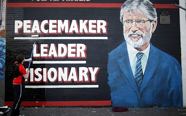 A newly painted mural of Gerry Adams on the Falls Road, West Belfast, Northern Ireland, May, 2 2014. (AP Photo/Peter Morrison, file) A newly painted mural of Gerry Adams on the Falls Road, West Belfast, Northern Ireland, May, 2 2014. (AP Photo/Peter Morrison, file)