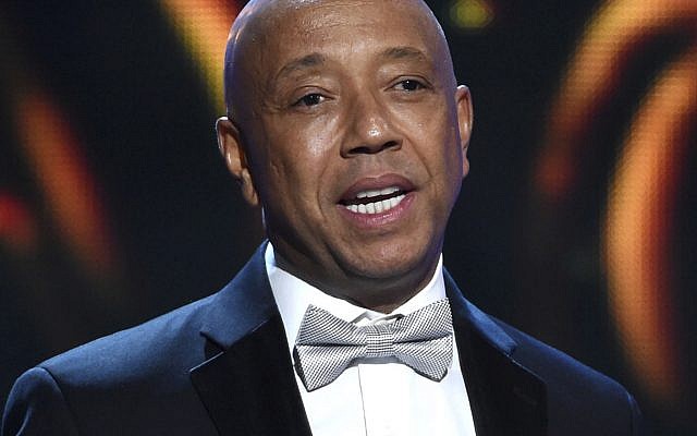 In this Feb. 6, 2015, file photo, hip-hop mogul Russell Simmons presents the Vanguard Award on stage at the 46th NAACP Image Awards in Pasadena, California (Chris Pizzello/Invision/AP, File) In this Feb. 6, 2015, file photo, hip-hop mogul Russell Simmons presents the Vanguard Award on stage at the 46th NAACP Image Awards in Pasadena, California (Chris Pizzello/Invision/AP, File)
