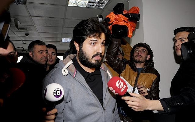 Turkish-Iranian businessman Reza Zarrab, who in 2017 was facing charges in the US for evading sanctions on Iran, is surrounded by the media members as he arrives at a courthouse in Istanbul, in a separate case against him, December. 17, 2013. (Depo Photos via AP/File) Turkish-Iranian businessman Reza Zarrab, who in 2017 was facing charges in the US for evading sanctions on Iran, is surrounded by the media members as he arrives at a courthouse in Istanbul, in a separate case against him, December. 17, 2013. (Depo Photos via AP/File)