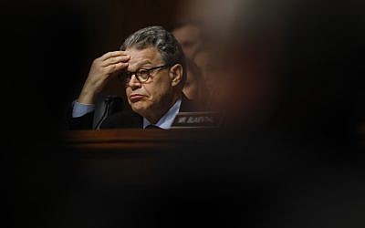 In this May 3, 2017, photo, Senate Judiciary Committee member Sen. Al Franken listens on Capitol Hill in Washington, as FBI Director James Comey testified before the committee on oversight of the FBI. (AP Photo/Carolyn Kaster)