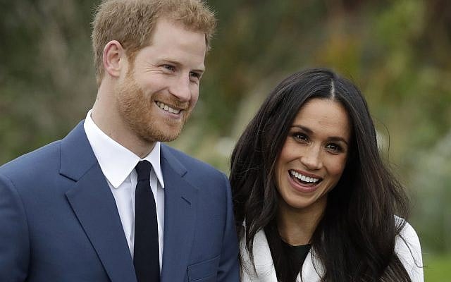 Britain's Prince Harry and his fiancee Meghan Markle pose for photographers during a photocall in the grounds of Kensington Palace in London, Monday Nov. 27, 2017. (AP Photo/Matt Dunham) Britain's Prince Harry and his fiancee Meghan Markle pose for photographers during a photocall in the grounds of Kensington Palace in London, Monday Nov. 27, 2017. (AP Photo/Matt Dunham)