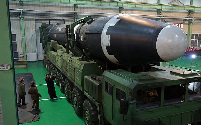 This November 29, 2017, image provided by the North Korean government shows North Korean leader Kim Jong Un, third from left, and what the North Korean government calls the Hwasong-15 intercontinental ballistic missile, in North Korea. (Korean Central News Agency/Korea News Service via AP) This November 29, 2017, image provided by the North Korean government shows North Korean leader Kim Jong Un, third from left, and what the North Korean government calls the Hwasong-15 intercontinental ballistic missile, in North Korea. (Korean Central News Agency/Korea News Service via AP)