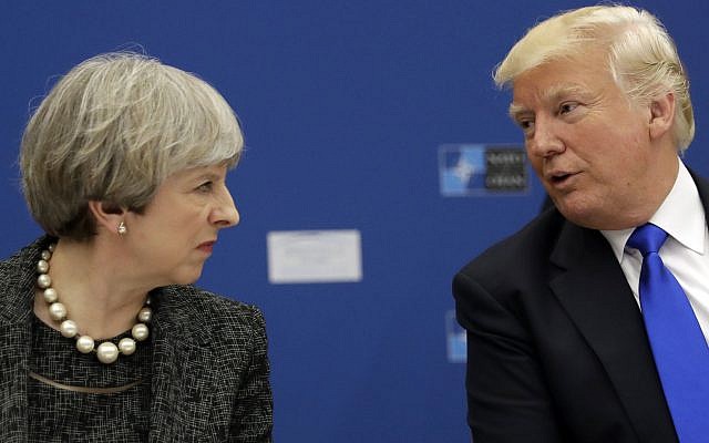 US President Donald Trump (right), speaks to British Prime Minister Theresa May at the NATO headquarters in Brussels, May 25, 2017. (AP/Matt Dunham, Pool) US President Donald Trump (right), speaks to British Prime Minister Theresa May at the NATO headquarters in Brussels, May 25, 2017. (AP/Matt Dunham, Pool)