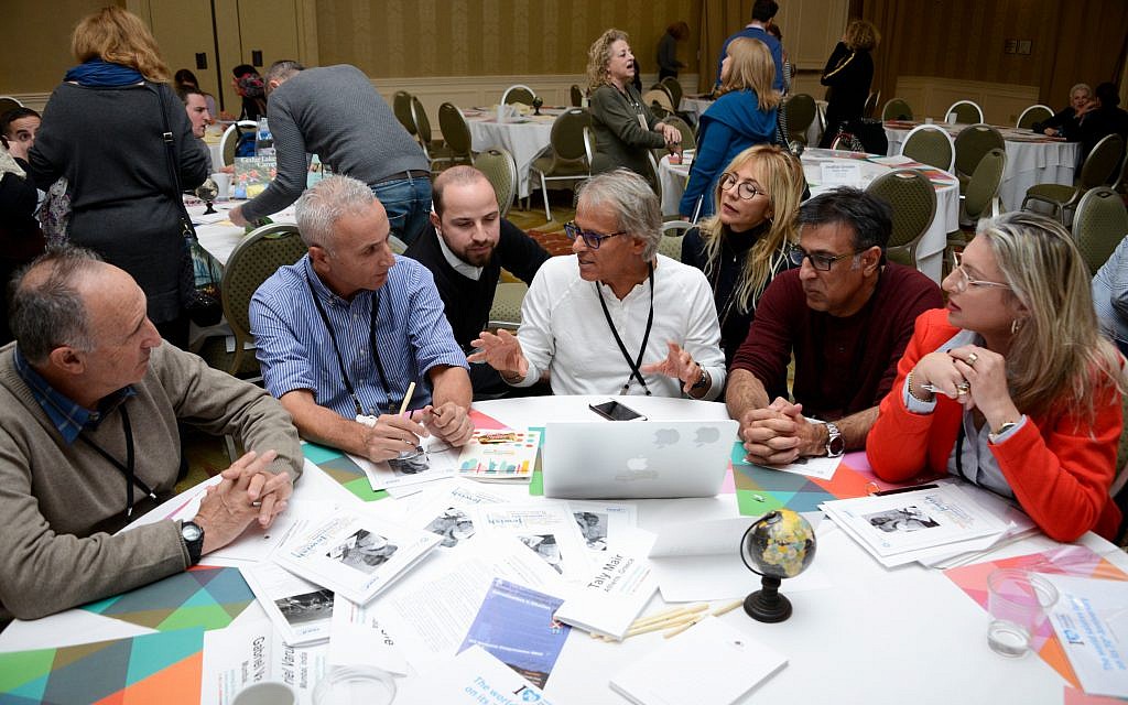 Representatives from different JCCs worldwide participating in a 'speed dating' event aimed at pairing up different centers on 2-3 year long projects. The event took place at the Amitim 2.0 JCC Global conference from November 5-9, 2017. (Photo credit: Magali Druscovich) Representatives from different JCCs worldwide participating in a 'speed dating' event aimed at pairing up different centers on 2-3 year long projects. The event took place at the Amitim 2.0 JCC Global conference from November 5-9, 2017. (Photo credit: Magali Druscovich)