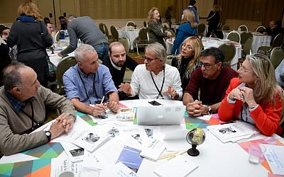 Representatives from different JCCs worldwide participating in a 'speed dating' event aimed at pairing up different centers on 2-3 year long projects. The event took place at the Amitim 2.0 JCC Global conference from November 5-9, 2017. (Photo credit: Magali Druscovich)
