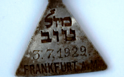 A pendant found at an excavation of the Nazi death camp in Sobibor, Poland, was identified as belonging to Karoline Cohn, a Jewish girl from Frankfurt, Germany, who is not known to have survived the war. (Yoram Haimi and Wojciek Mazurek/via JTA)