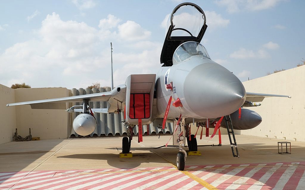 Illustrative. An F-15 fighter jet sits outside its hangar, canopy up, on the Ovda air base in southern Israel during the international Blue Flag exercise on November 9, 2017. (Judah Ari Gross/Times of Israel)