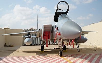 Illustrative. An F-15 fighter jet sits outside its hangar, canopy up, on the Ovda air base in southern Israel during the international Blue Flag exercise on November 9, 2017. (Judah Ari Gross/Times of Israel)