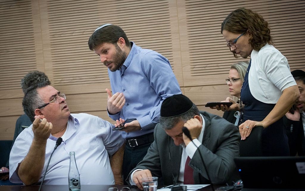 Coalition chairman Likud MK David Bitan, left, with Jewish Home MK Bezalel Smotrich, second left, during a meeting of the Finance Committee in the Knesset, November 6, 2017. (Miriam Alster/Flash90)