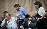 Coalition chairman Likud MK David Bitan, left, with Jewish Home MK Bezalel Smotrich, second left, during a meeting of the Finance Committee in the Knesset, November 6, 2017. (Miriam Alster/Flash90)