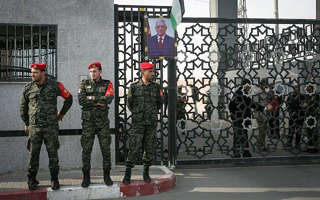 Palestinian security forces stand guard at the Rafah border crossing with Egypt, in the southern Gaza Strip on November 18, 2017. (Abed Rahim Khatib/Flash90) Palestinian security forces stand guard at the Rafah border crossing with Egypt, in the southern Gaza Strip on November 18, 2017. (Abed Rahim Khatib/Flash90)