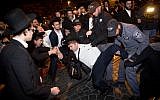 Ultra-Orthodox Jewish men protest against the army draft, at the entrance to Jerusalem, November 19, 2017. (Yonatan Sindel/Flash90)