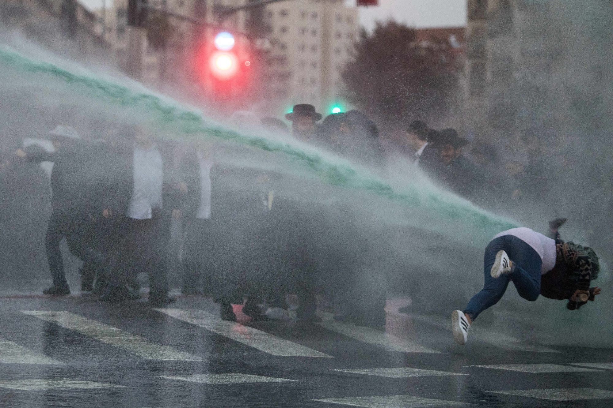 Video Shows Passerby Blasted By Water Cannon At Jerusalem Protest The