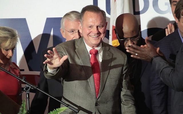 Republican candidate for the US Senate in Alabama, Roy Moore (R) greets supporters at an election-night rally on September 26, 2017, in Montgomery, Alabama. (Scott Olson/Getty Images via JTA) Republican candidate for the US Senate in Alabama, Roy Moore (R) greets supporters at an election-night rally on September 26, 2017, in Montgomery, Alabama. (Scott Olson/Getty Images via JTA)